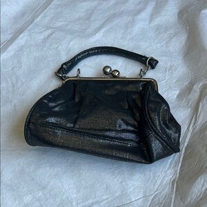 Unlisted Shimmering Black Clutch
